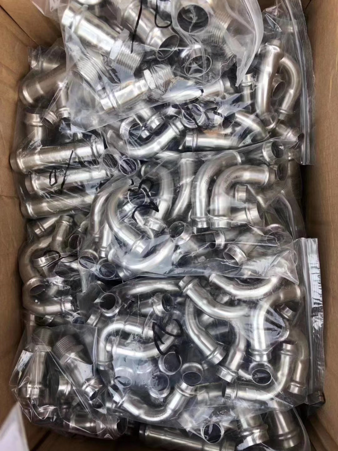 organized stainless steel pipe fittings for potable water plumbing